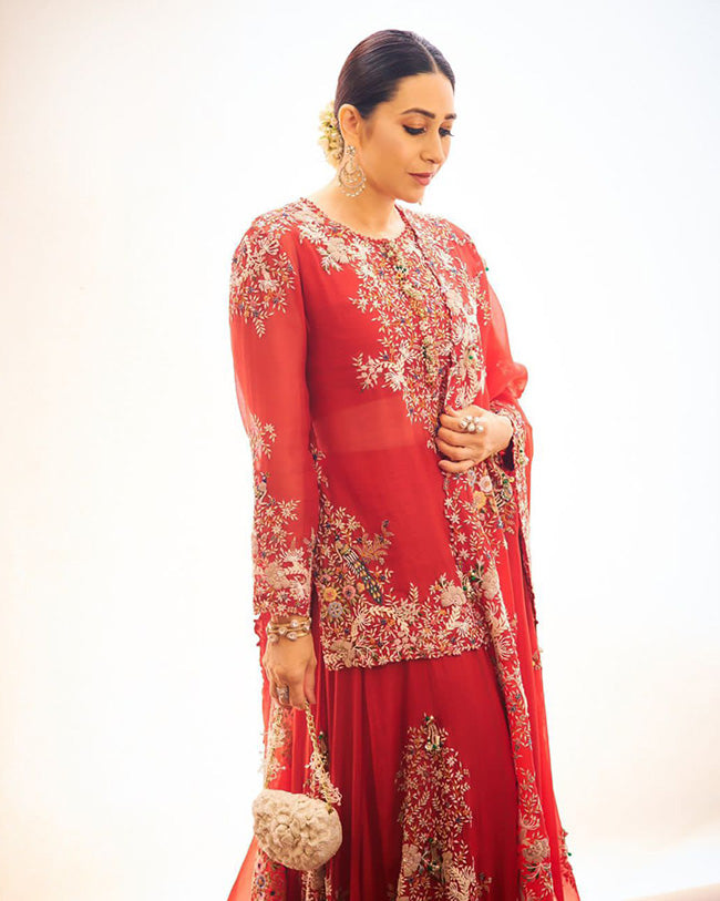 Karishma Kapoor in traditional look, wearring Adara earrings from Vasundhara