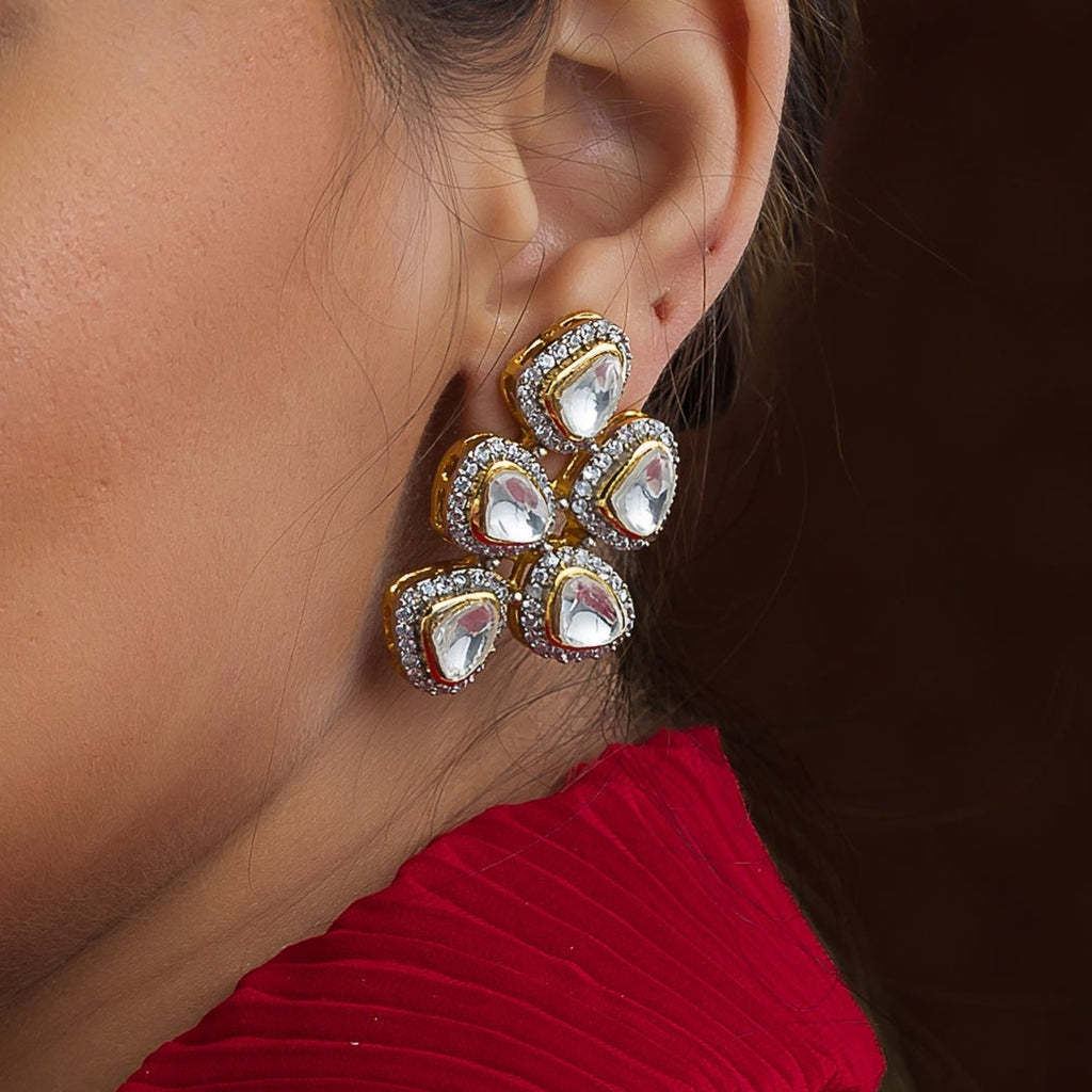 Rania Earrings is displayed on a model's ear