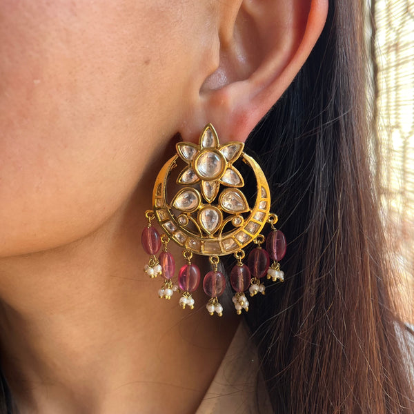 A model is posing with Vasundhara’s Hazrat Chandbaali With Pink Drops 