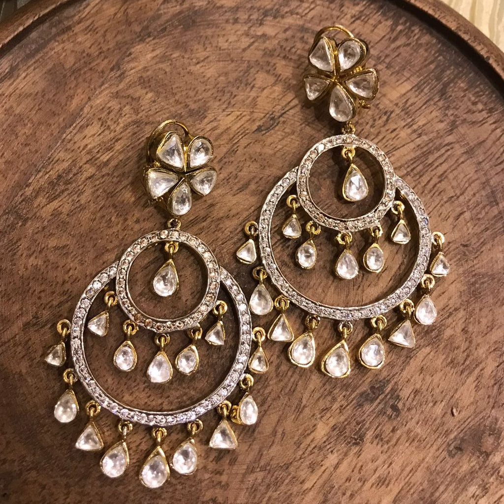 The image represents Adara Earrings from Vasundhara Jewelry