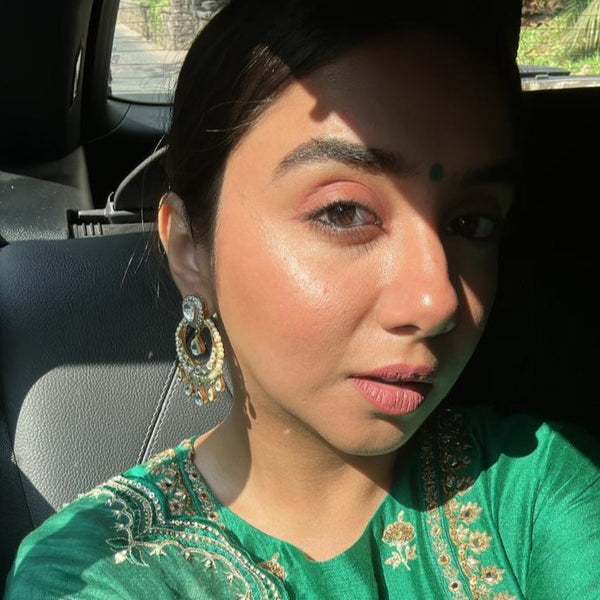 Prajakta Koli is posing with Ezra Earrings from Vasundhara