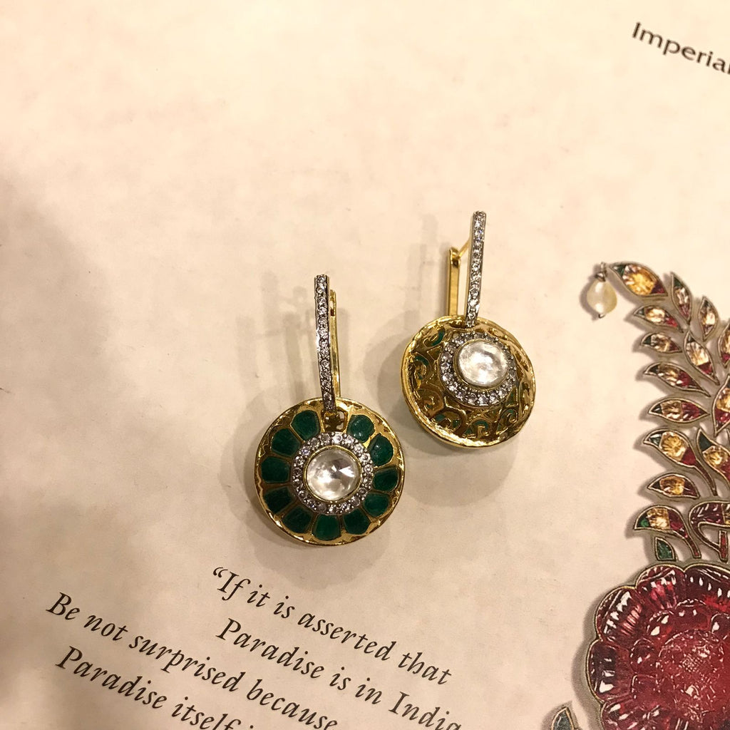 The picture shows 2 in 1 Narmada Earrings from Vasundhara Jewelry