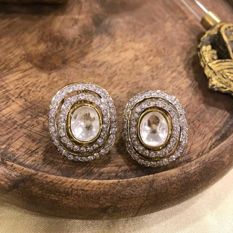 Kundan with Diamantes Top from Vasundhara Highlighted on Wood